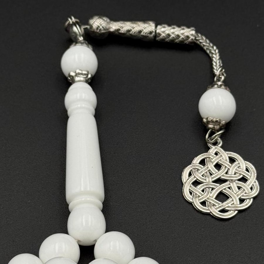 White color tasbih with plastic beads and metal tassel