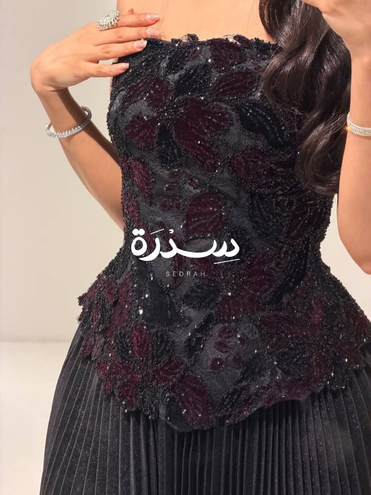 فستان سهرة كورسيه بكسرات البلسيه