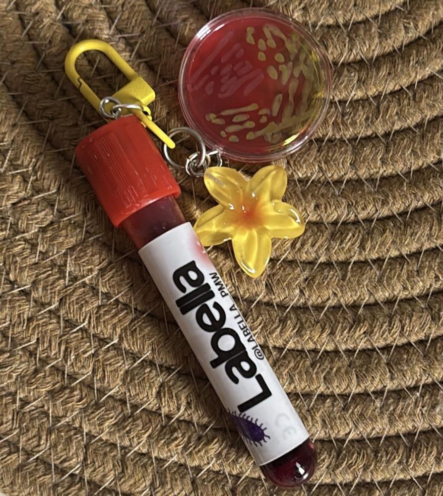 Red tube and yellow flower and red agar