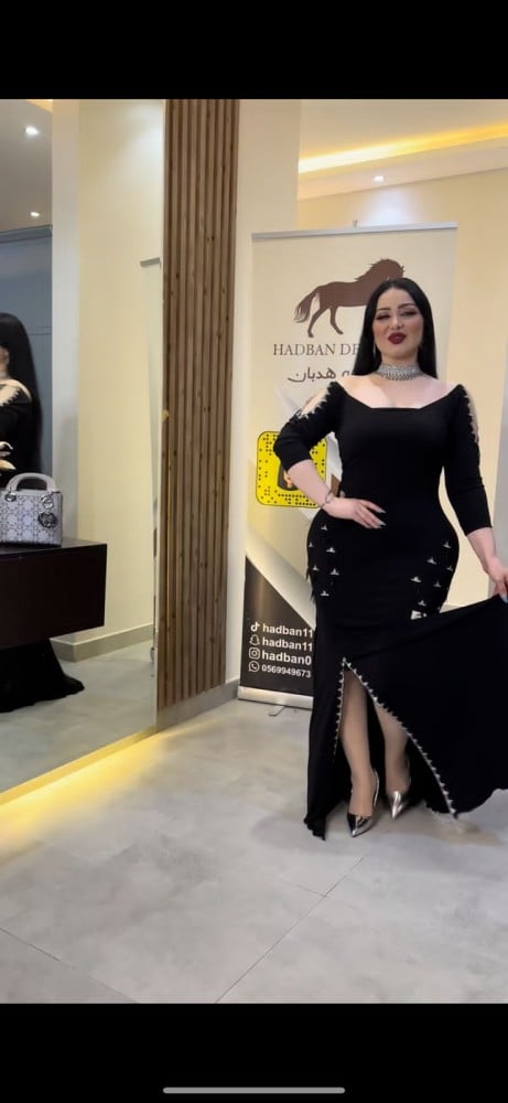 فستان اسود استرتش وسط كلف فضي