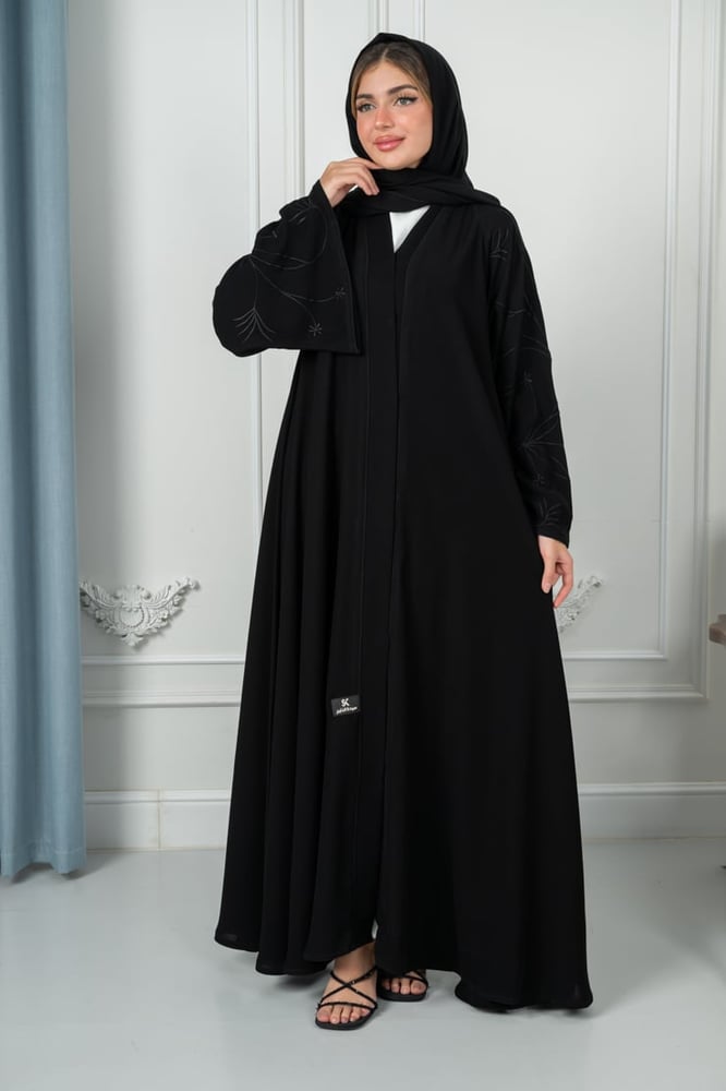 Ceramic abaya in deep black, first grade, with puffed pink sleeves