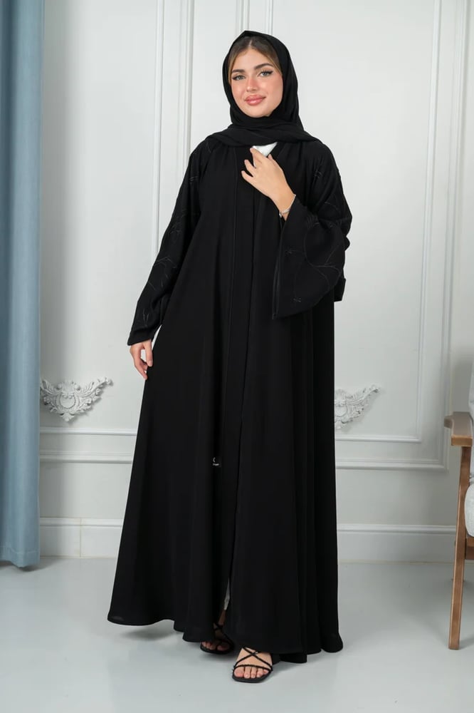 Ceramic abaya in deep black, first grade, with puffed pink sleeves