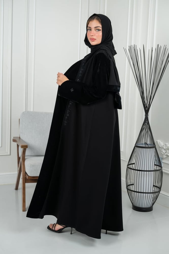 Crepe abaya with luxury velvet criteon and hand embroidery on the sleeve edges