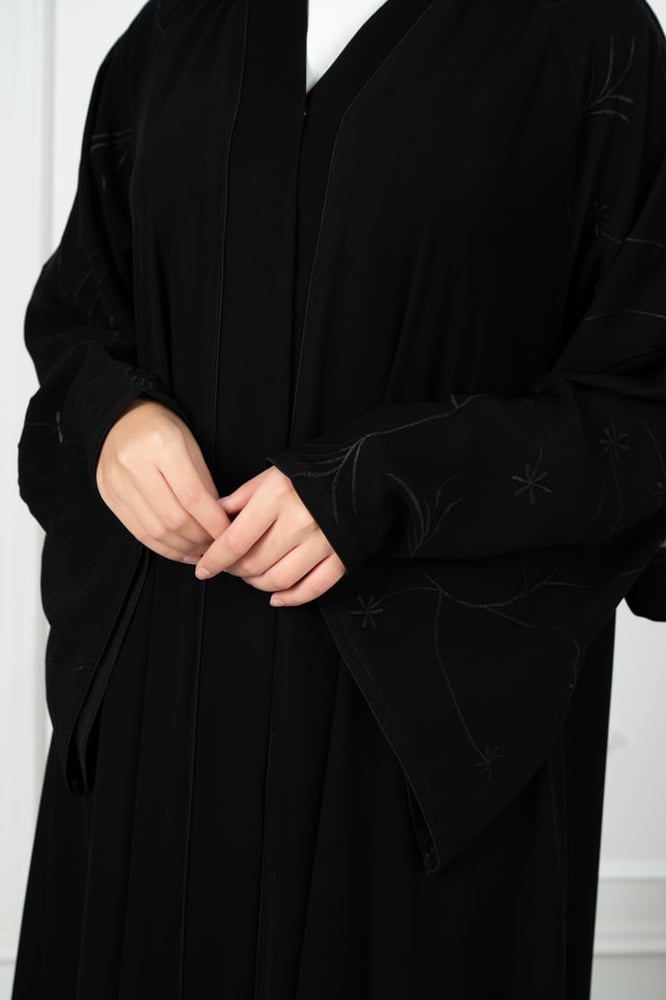 Ceramic abaya in deep black, first grade, with puffed pink sleeves