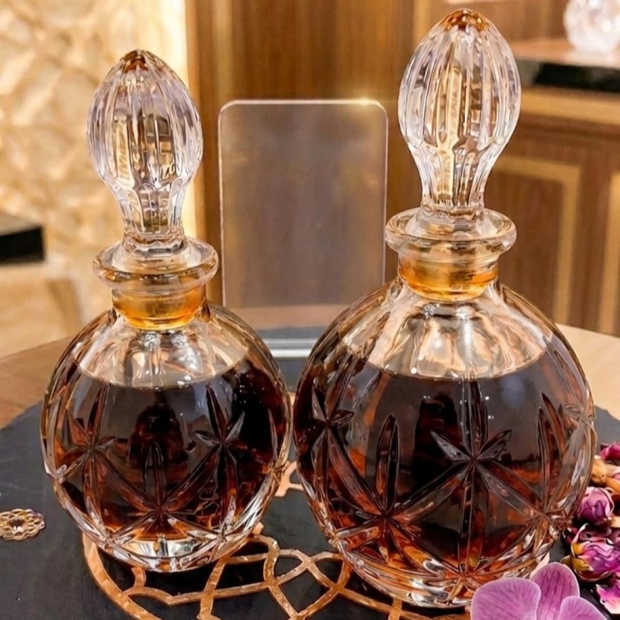 زجاجة عطور فاخرة شفافة متوفرة بحجمين 200 مل _ 100 مل