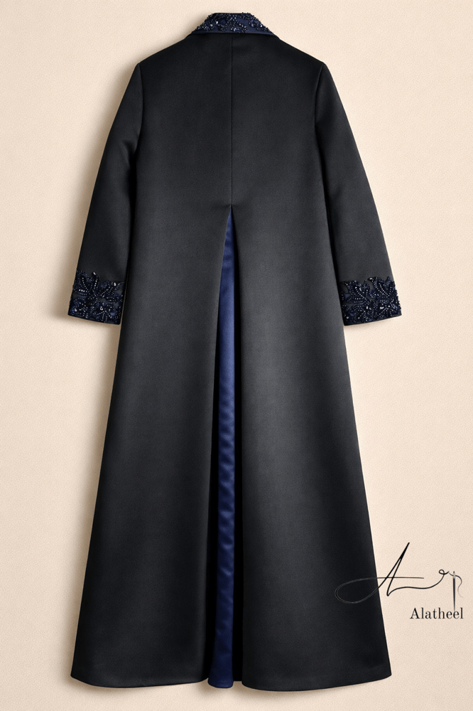 A thobe, Feteet Sila, black with navy blue, with embroidery and a slit at the back