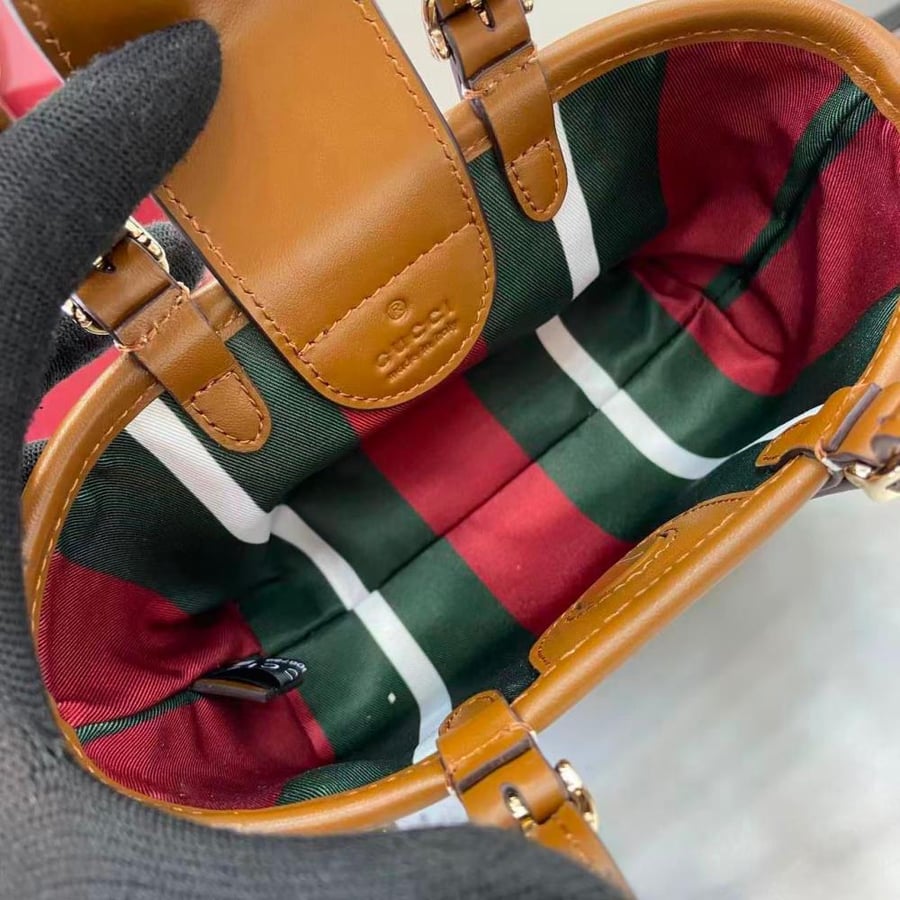 قوتشي Emblem mini