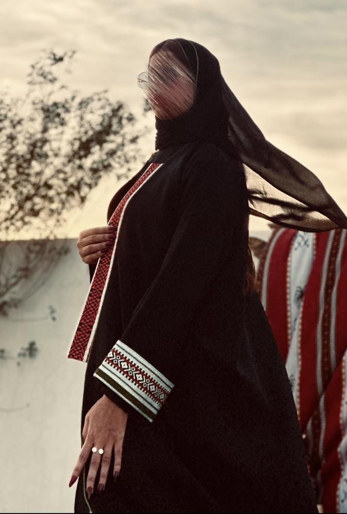 Kareep abaya standing Korean with traditional Sadu details