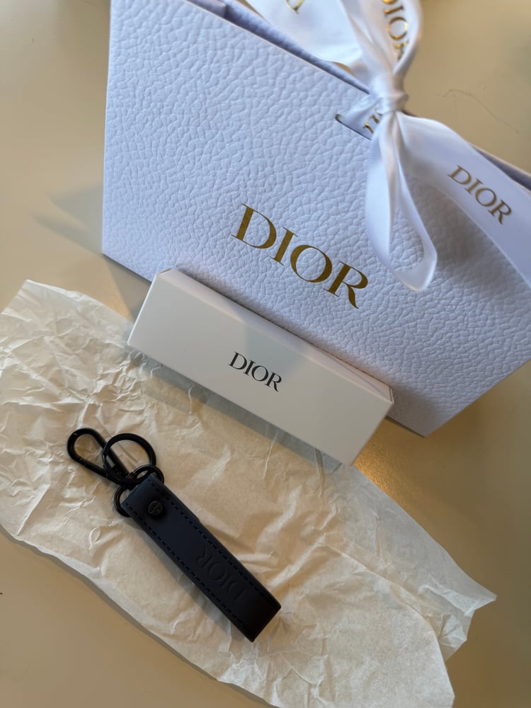 Dior medal with the box and bag