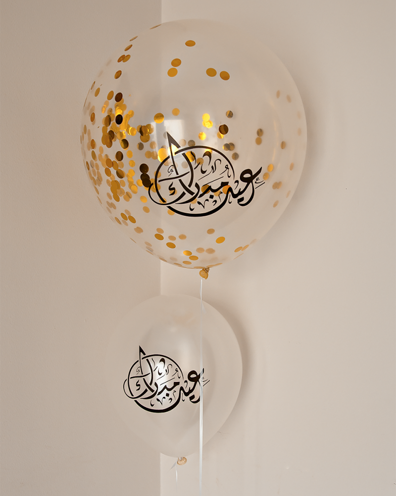 بالونة العيد شفافة و زينه ذهبية منثورة