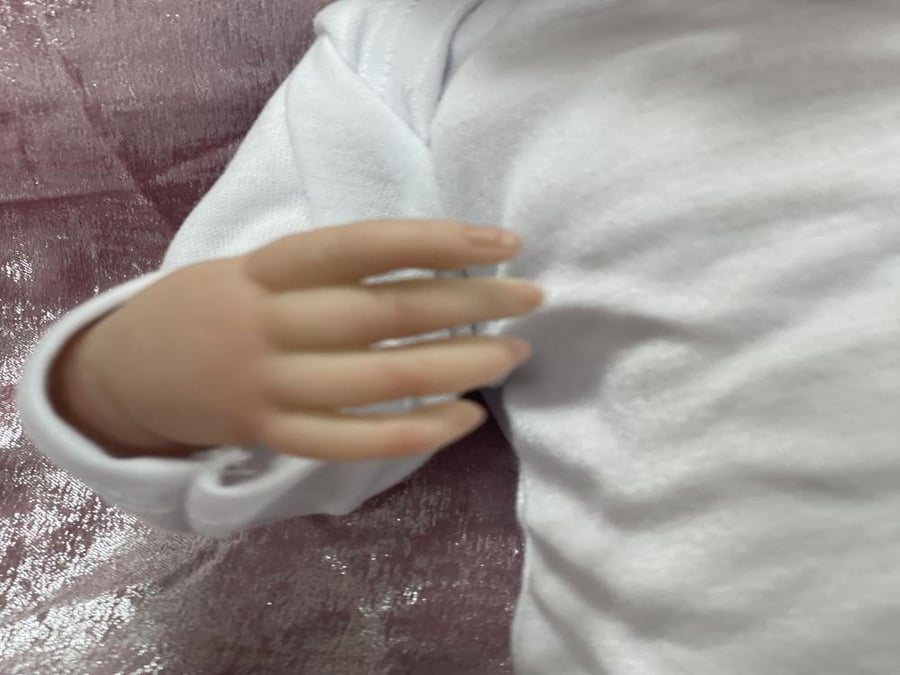 دمية الطفلة الرضيعة