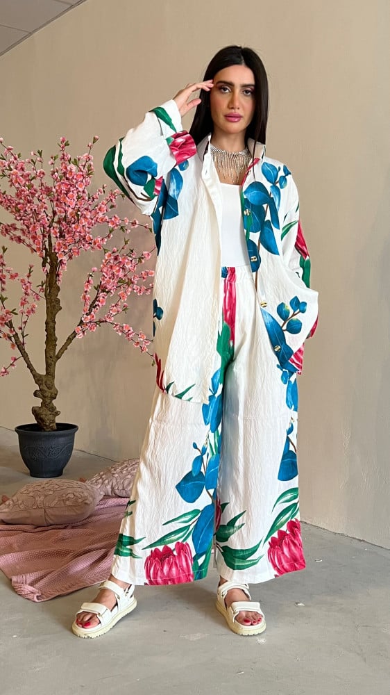 A loose, light, and cool summer set in white with floral print linen.