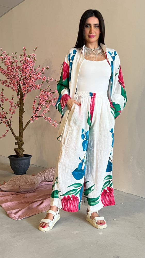 A loose, light, and cool summer set in white with floral print linen.