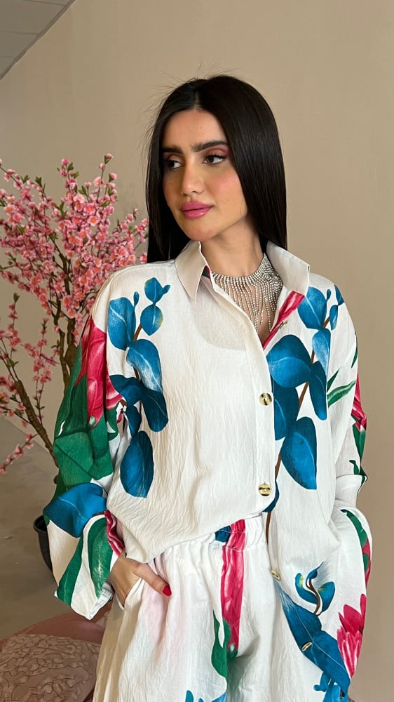 A loose, light, and cool summer set in white with floral print linen.