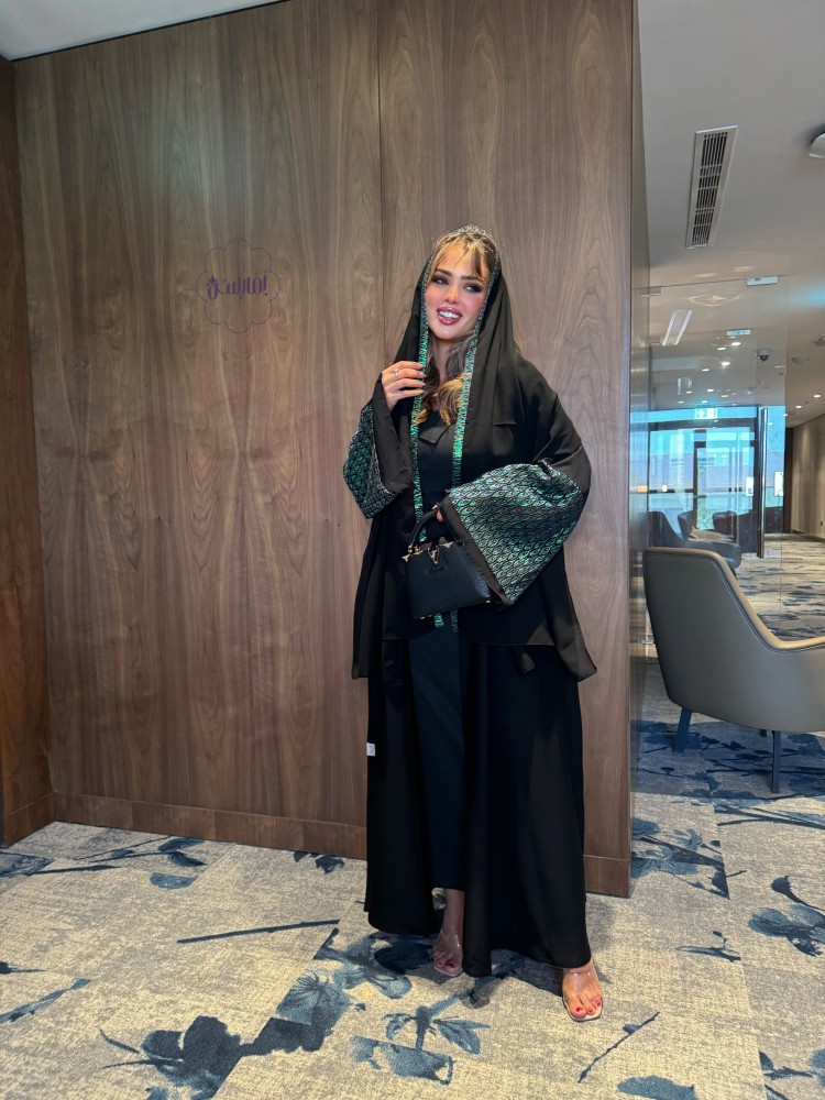 طاؤوس عبايه