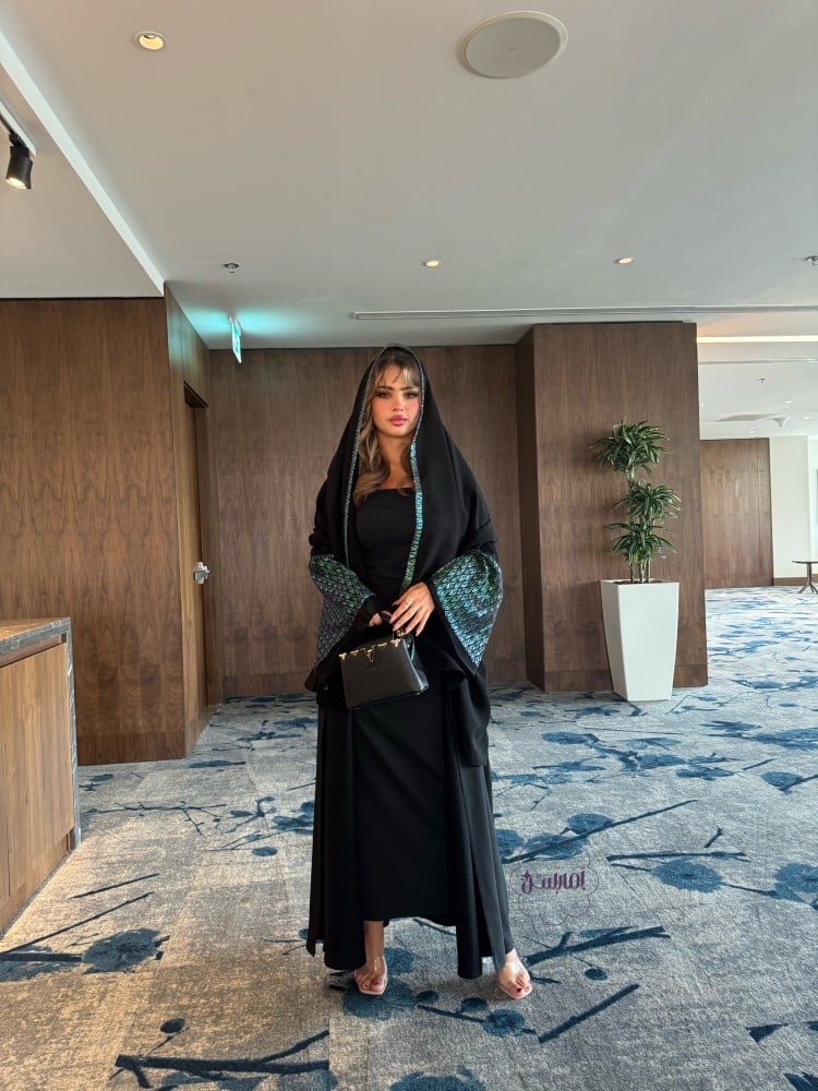 طاؤوس عبايه