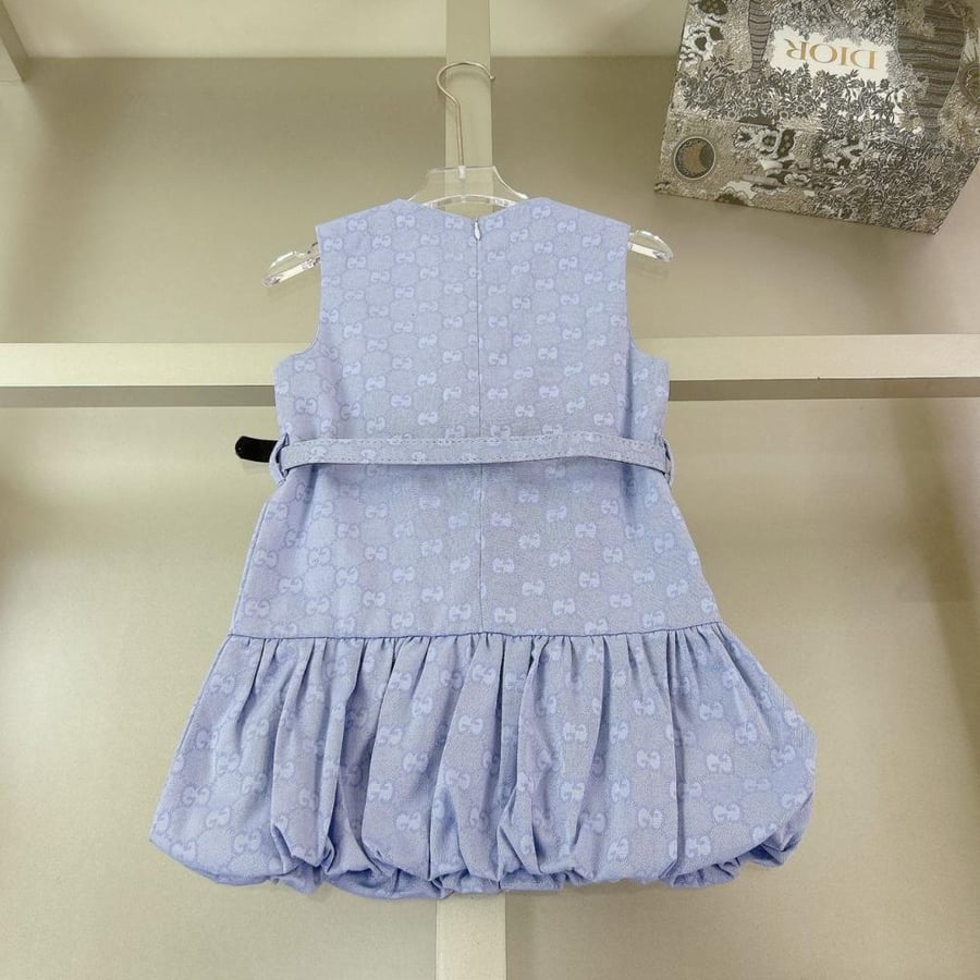 Girls' dress with elegant details and a blue belt