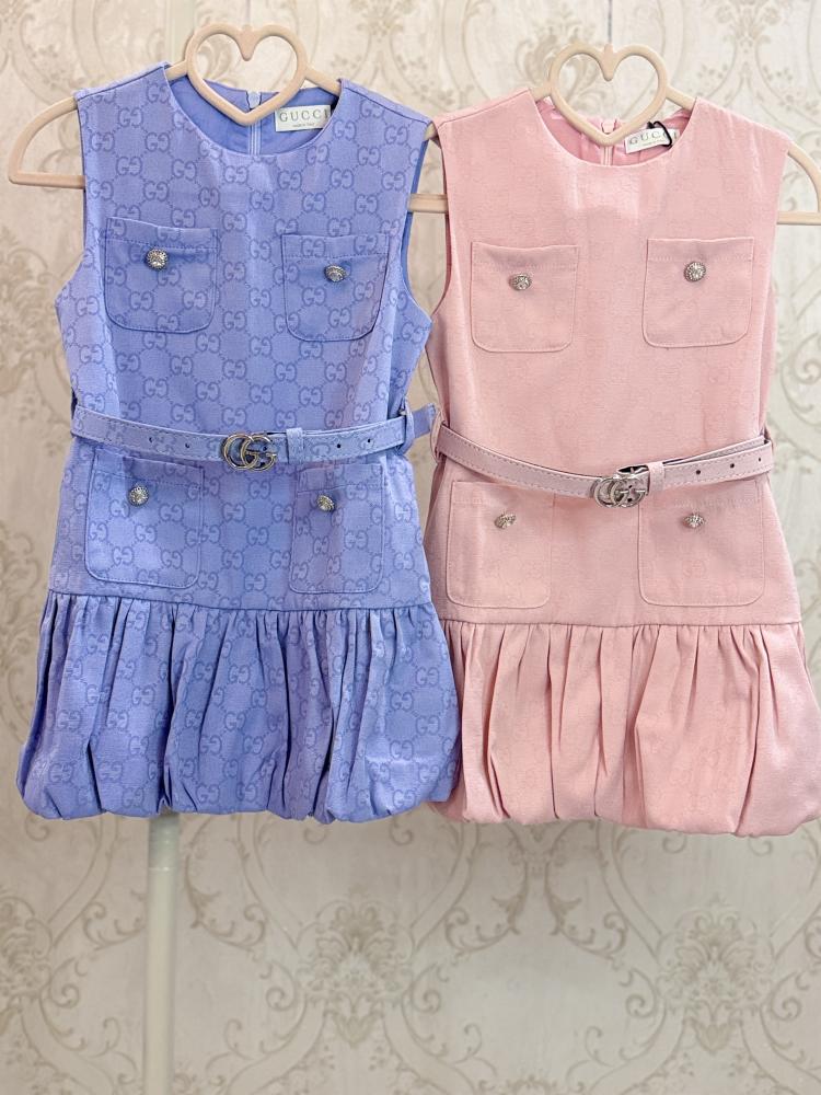 Girls' dress with elegant details and a blue belt