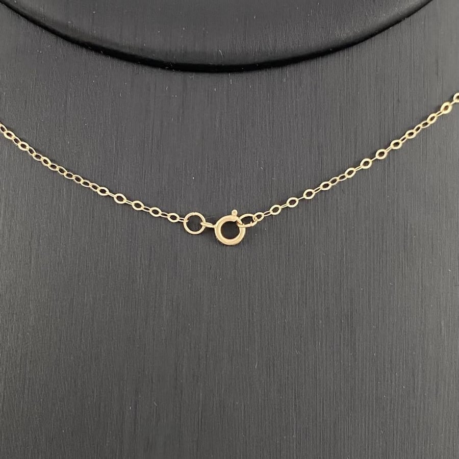 A Chaumet 18-karat gold set weighing 11.19 grams with matching pendants that tell the story of your elegance