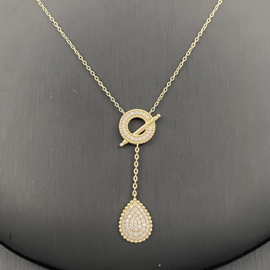 18 karat gold set, weight 10.31 grams