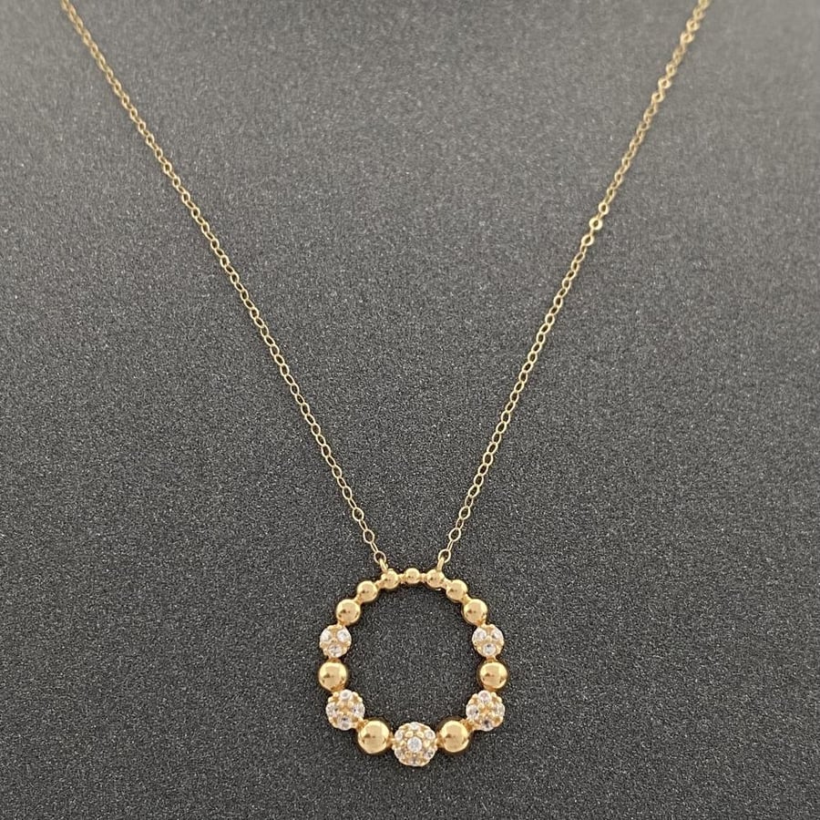 18-karat gold necklaces, weighing 2.94 grams