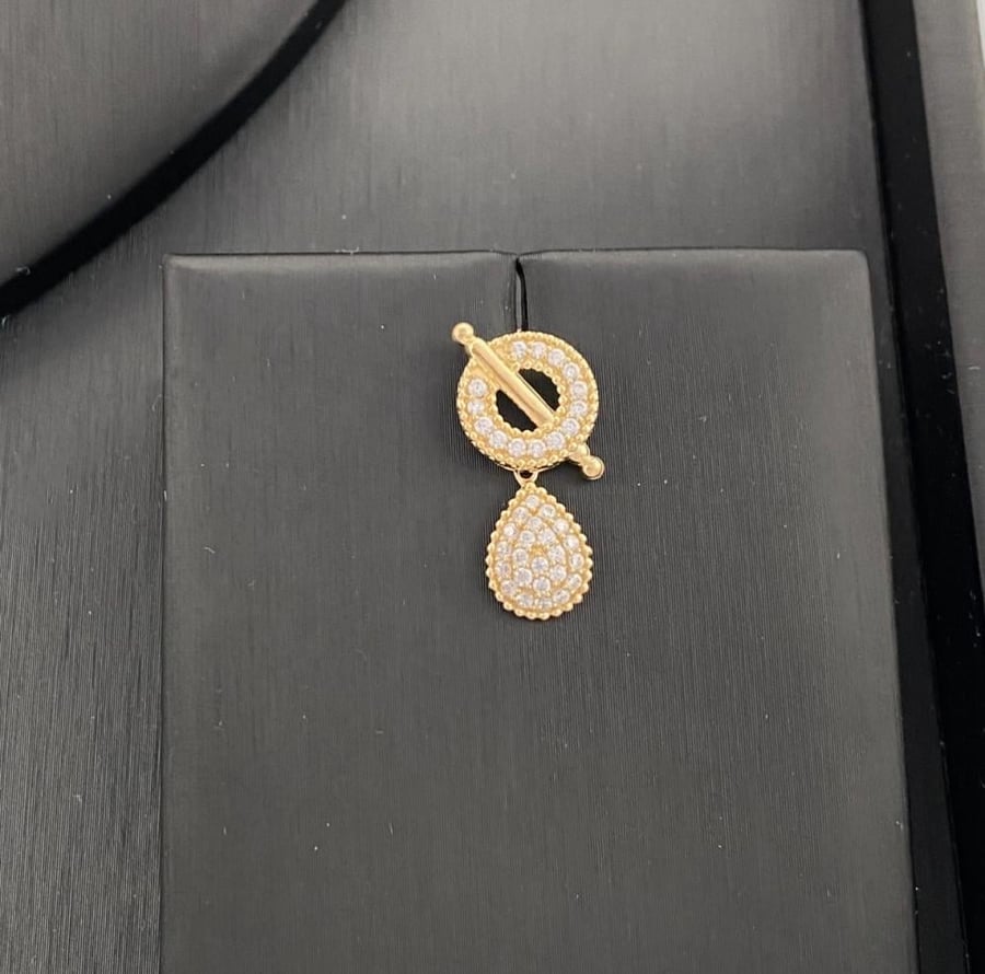 18 karat gold set, weight 10.31 grams
