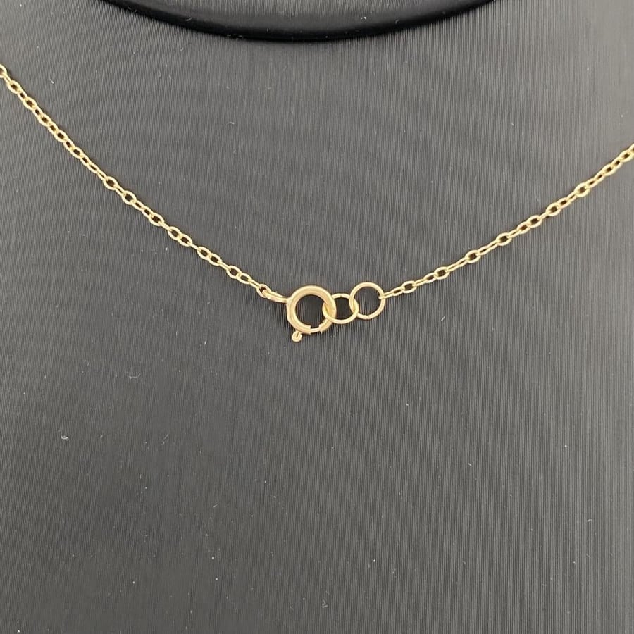 18 karat gold set, weight 10.31 grams