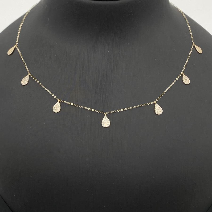 18 karat gold set, weight 3.01 grams