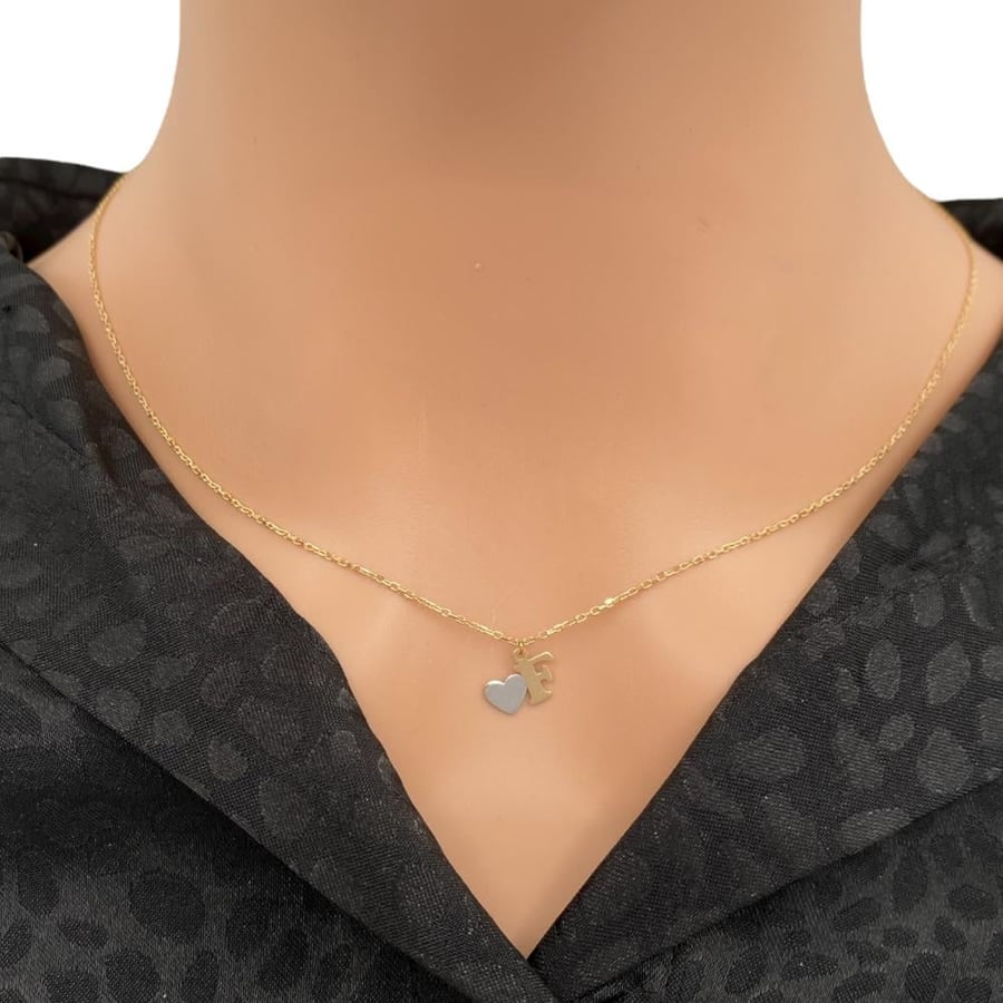 Letter F, 18k gold, weight 1.71 grams