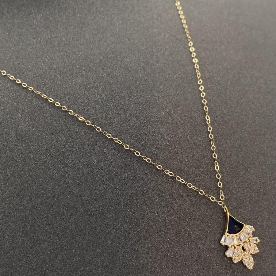 18-karat gold necklaces, weighing 3.54 grams