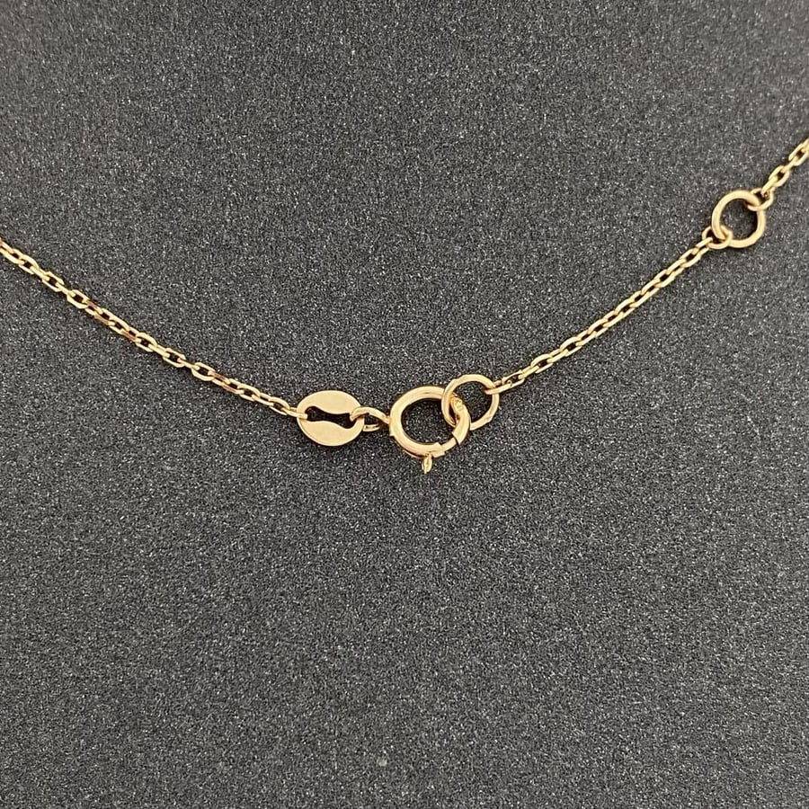Letter F, 18k gold, weight 1.71 grams