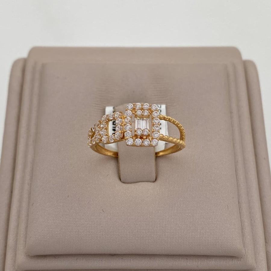 21-karat gold ring, weighing 1.27 grams