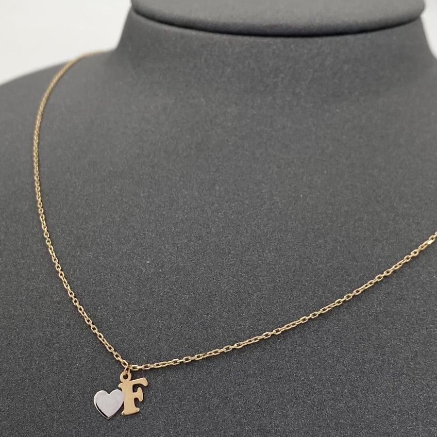 Letter F, 18k gold, weight 1.71 grams
