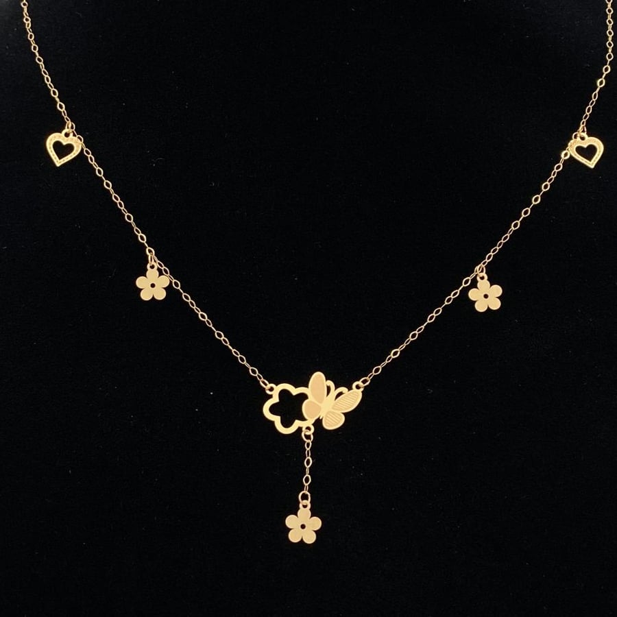 21 karat gold butterfly necklace, weight 0.93 grams