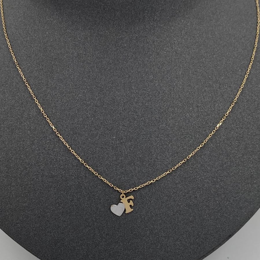 Letter F, 18k gold, weight 1.71 grams