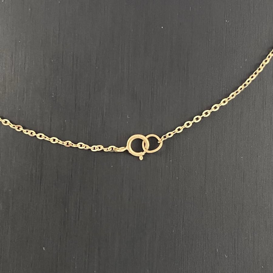 Sweet 18 karat gold set, weight 7.10 grams