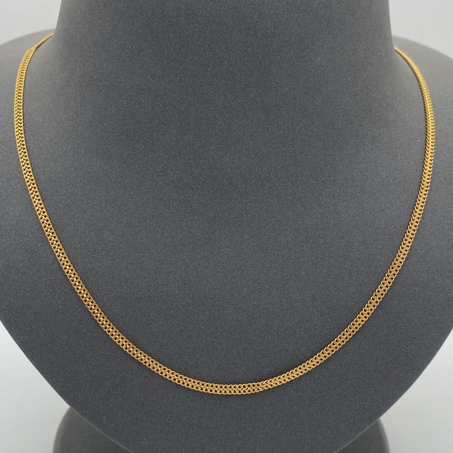 21-karat gold chain, weighing 8.61 grams