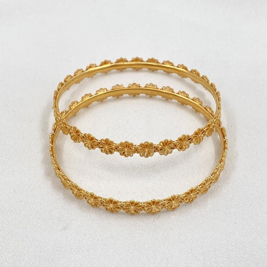 21-karat gold bracelet, weight 9.70 grams