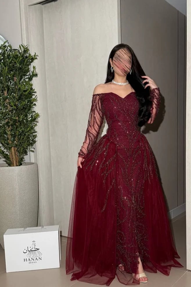 فستان نوارتي سهرة انييييق كلوش ب لون العودي اكمام طويله ع خرز وتل بذيل خييالي