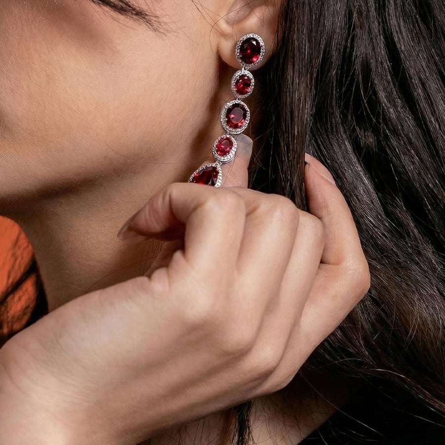 Silver Velora Earrings with Radiant Red Stones