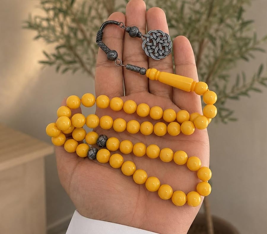 مسباح بكلايت 10 ملي 51 خرزه  بفواصل  فضه و طربزونه شبيه الفضه لون اصفر