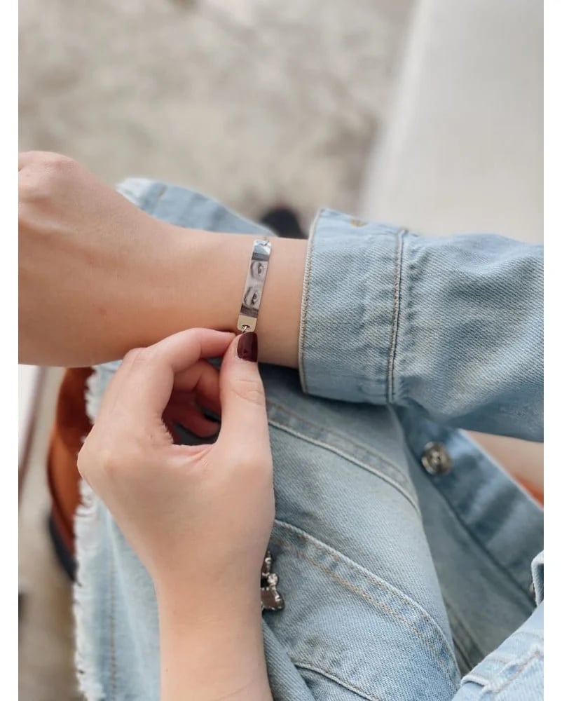 Silver-colored bracelet with a printed picture