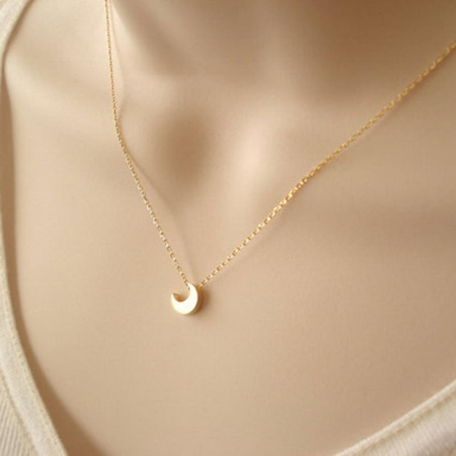 A necklace in the shape of the moon