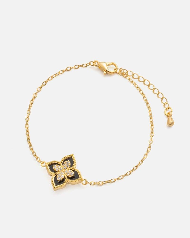 A distinctive women's bracelet in gold and black.