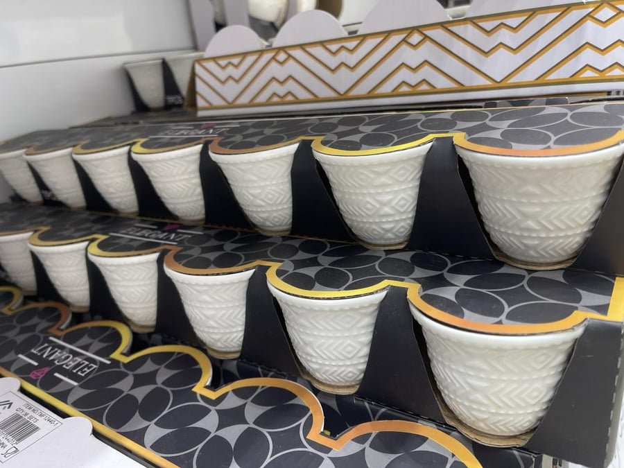 White coffee cups with raised engravings, 6 pieces