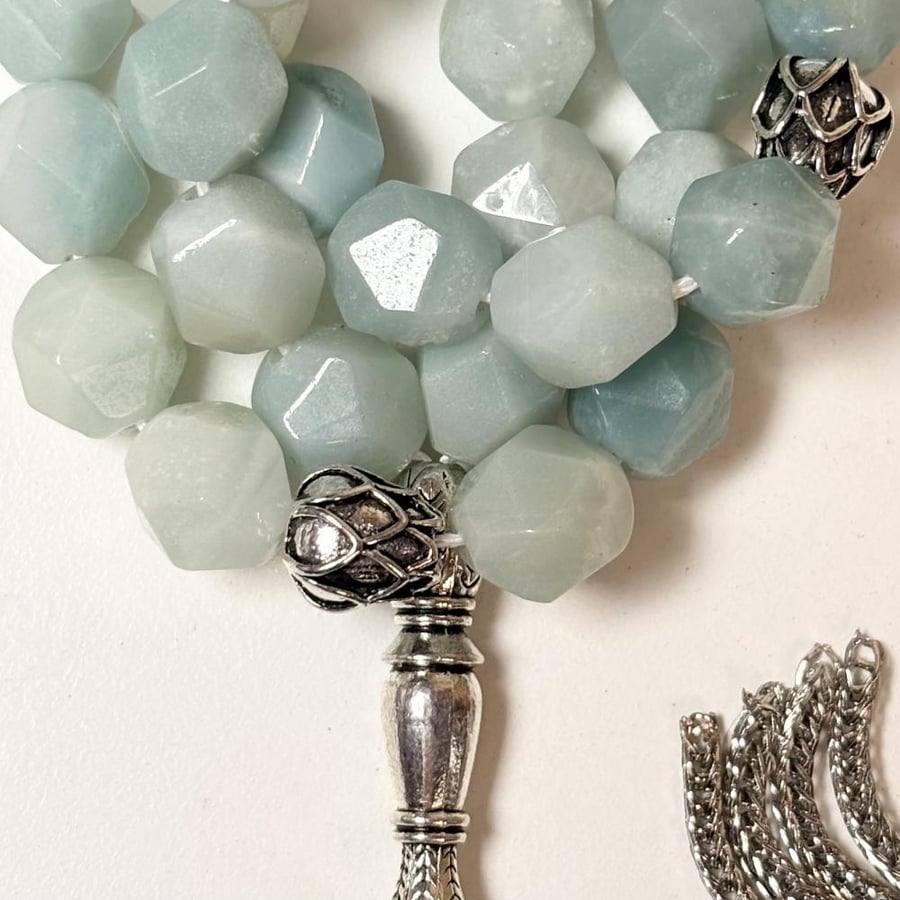A distinctive rosary made of natural Amazonite stone with a diamond-shaped design
