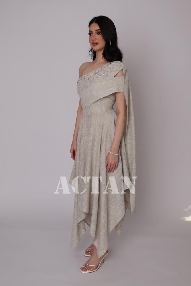 One-shoulder dress with uneven lengths, beige color