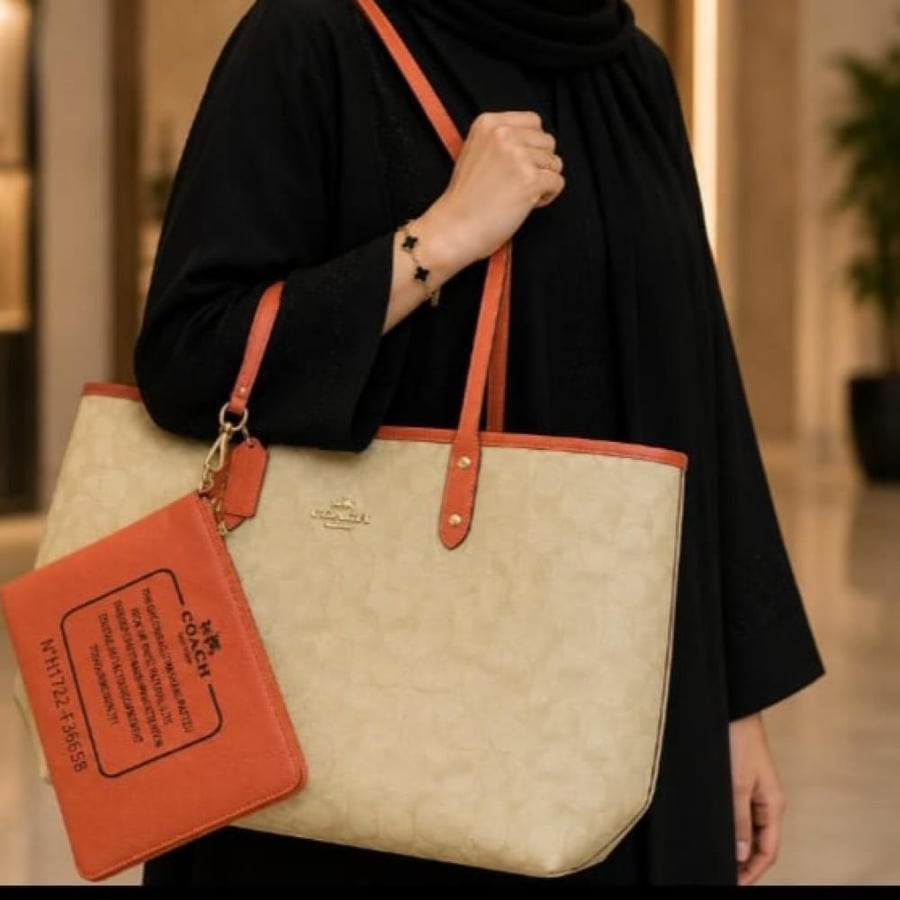 حقيبة يد نسائية من ماركة كوتش