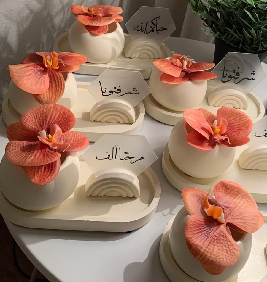 Off-white hospitality sets with pink acrylic