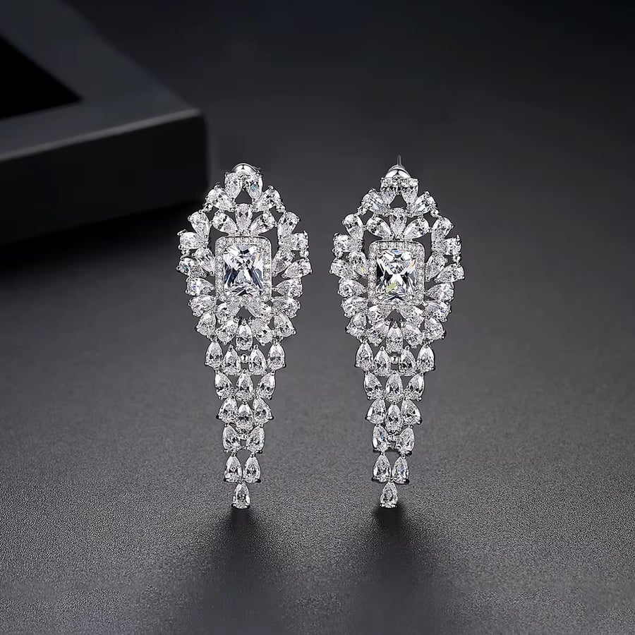 Long ring with zircon, rhodium-plated